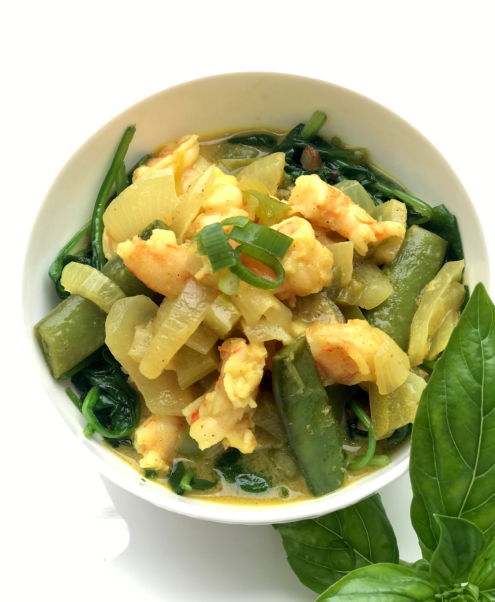 Curry over Steamed Spinach
