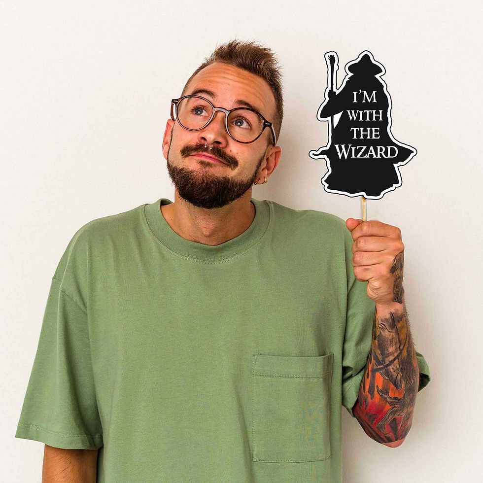 Thumbnail: Man holds 'I'm With The Wizard' lord of the rings party prop