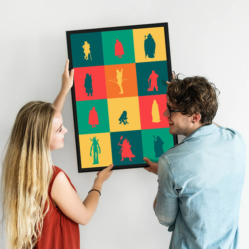 happy couple hanging a Lord of the rings pop art poster