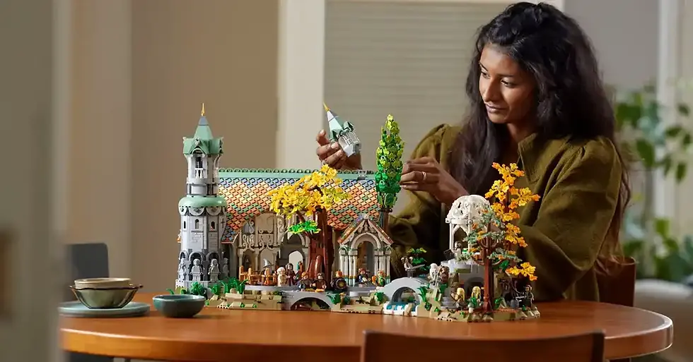 woman building LEGO rivendell - LOTR