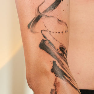 Kinesiska tatueringar i kalligrafi och måleri