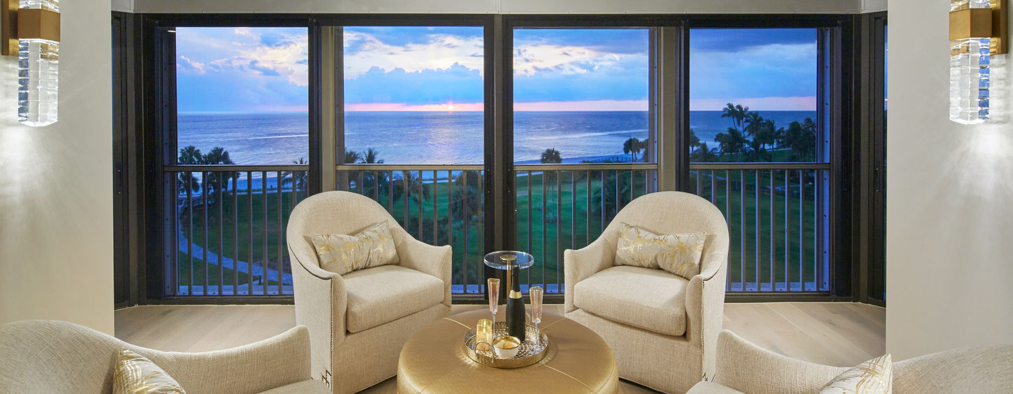 Remodeled living room overlooking the ocean in condo 