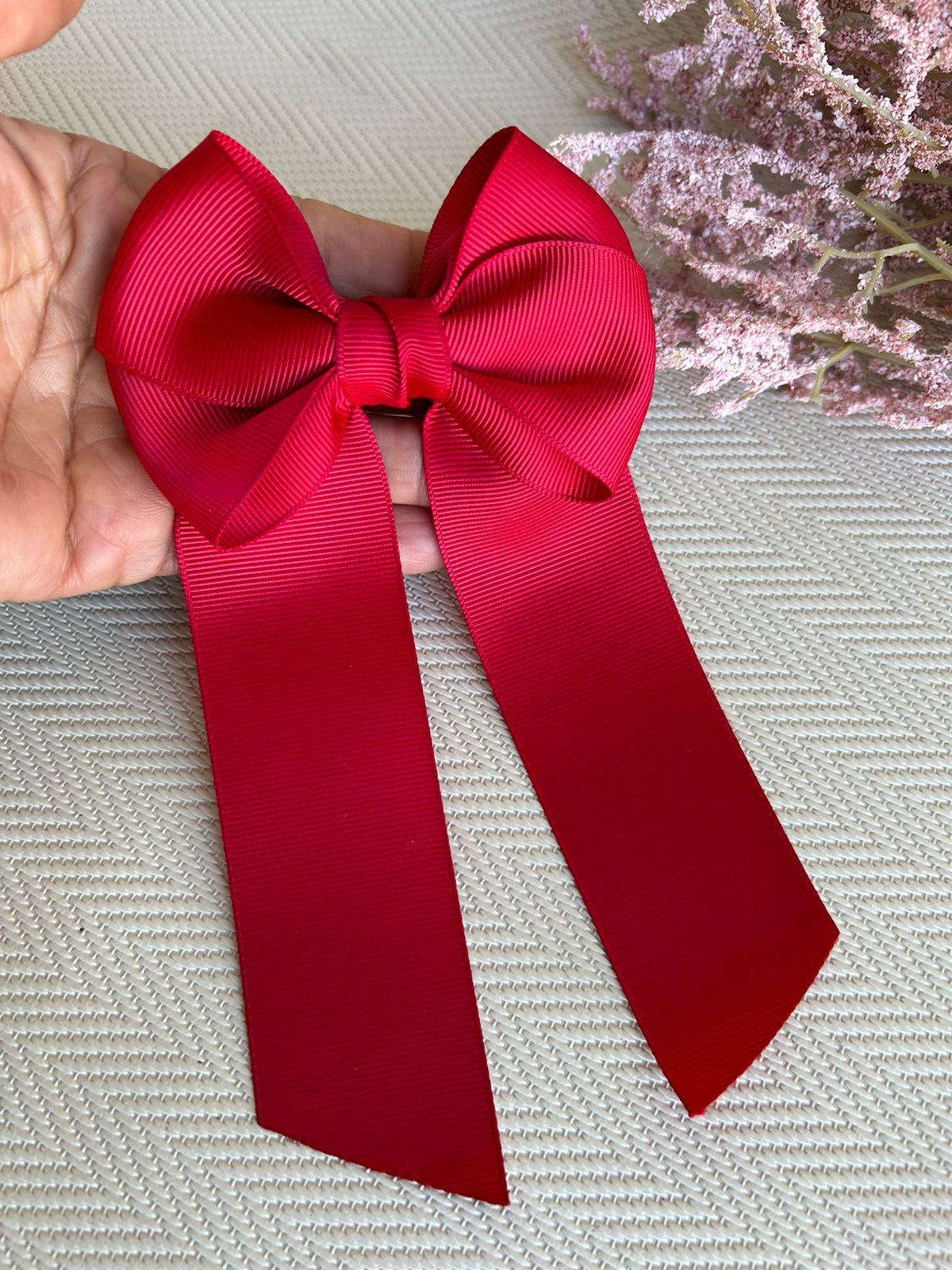 Laço cruzado com pontas