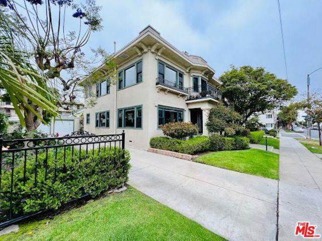 Welcome to Cherry Flats - Nestled in the heart of Long Beach, this light-filled, breezy condo offers timeless charm with modern conveniences. Perched overlooking Bixby Park and just steps from the Pacific Ocean, this 2-bedroom, 1.5-bathroom home invites you to enjoy the very best of coastal living. As you approach, the classic front porch welcomes you with its ocean views and park-side ambiance perfect for sipping your morning coffee or enjoying the vibrant atmosphere of the neighborhood. Inside, you'll be greeted by beautiful hardwood floors and an open-concept layout that seamlessly connects the living, dining, and kitchen spaces. Convenience is at your fingertips with in-unit laundry, a single-car garage, and an additional designated parking space. Located less than a block from the beach, this home offers direct access to Long Beach's coastal lifestyle. Enjoy weekly farmers markets and daily yoga sessions at Bixby Park, all just steps from your door. With low HOA dues and only four units in the building, this intimate community offers both affordability and exclusivity. Cherry Flats is more than a home, it's a lifestyle. Don't miss this rare opportunity to own a piece of Long Beach history in a prime location!