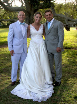 Happy couple with the Bow Tie Wedding Guy after getting married