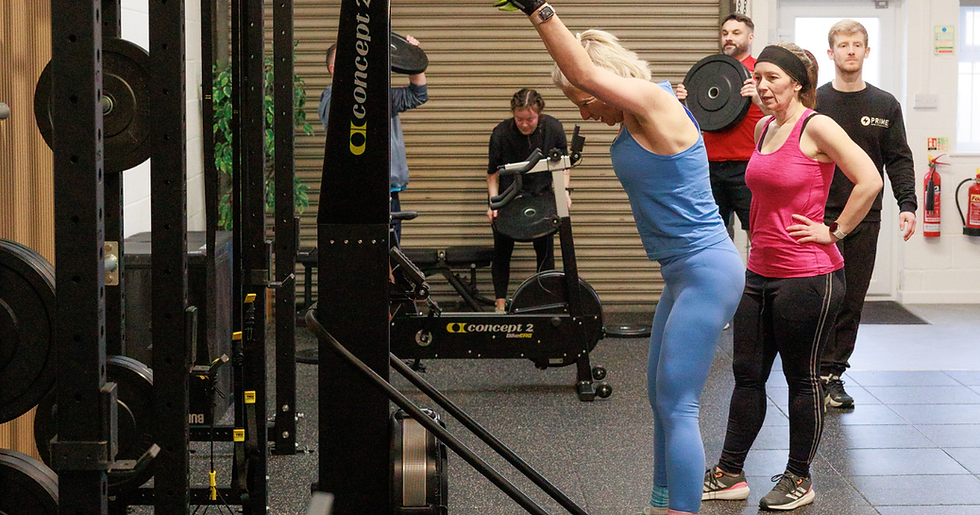 An example of a small group personal training sessions at Prime Fitness in Royal Wootton Bassett, showing a friendly coach leading a strength and aerobic session