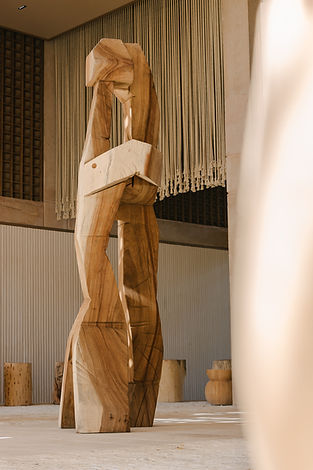 escultura de madera arte recepcion