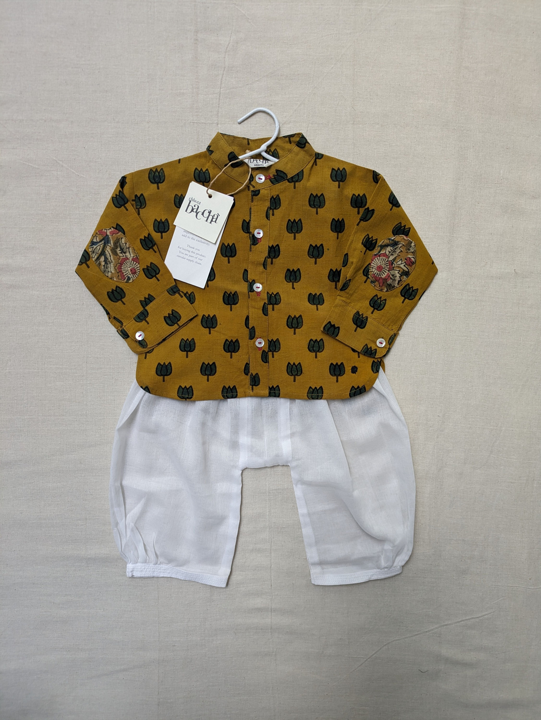 Lotus print shirt with white pant