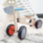 Toddlers wooden ride on mini bike in kids nursery