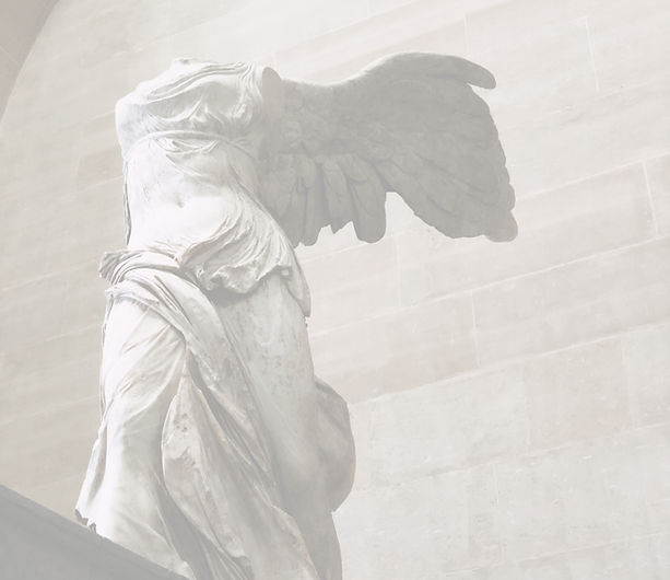 white and gray figurine_edited.jpg