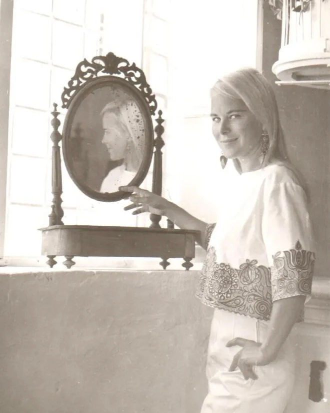 Marianne Ihlen in a mirror