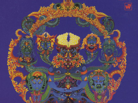 Purple album art with pink text, ring of fire, green serpents, and blue dragons and dragon-headed Buddha