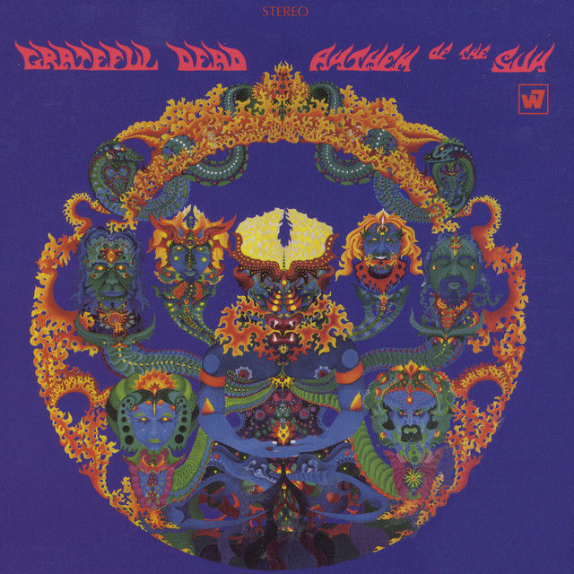 Purple album art with pink text, ring of fire, green serpents, and blue dragons and dragon-headed Buddha