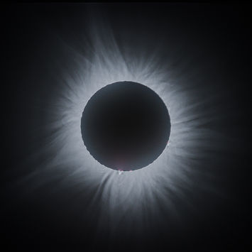 Total solar eclipse with the coronas of the sun.