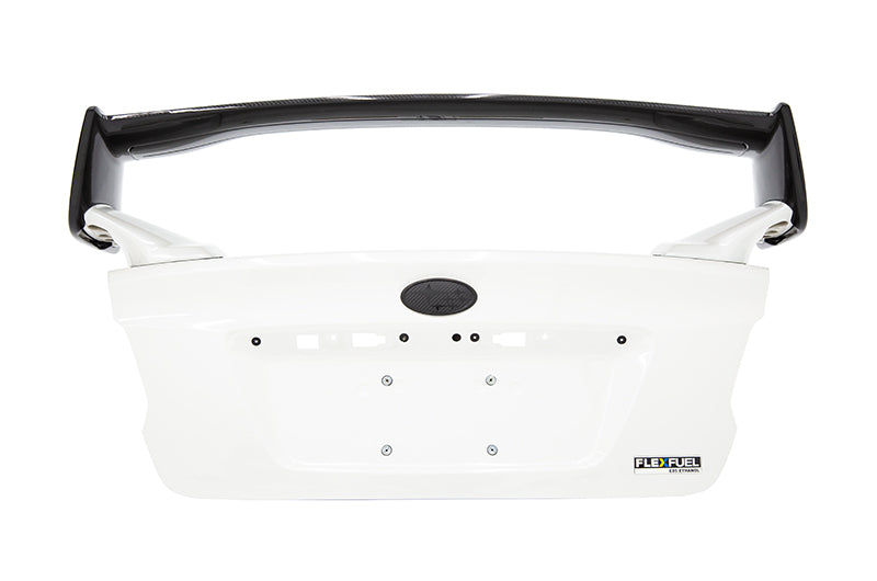 This OLM STI Style CF/Gloss Black (underside) Spoiler is sure to turn heads.