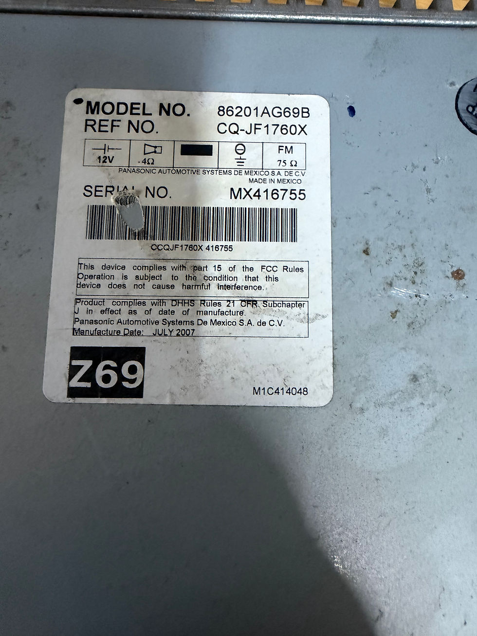 Subaru Impreza OEM part label with model 86201AG69B.