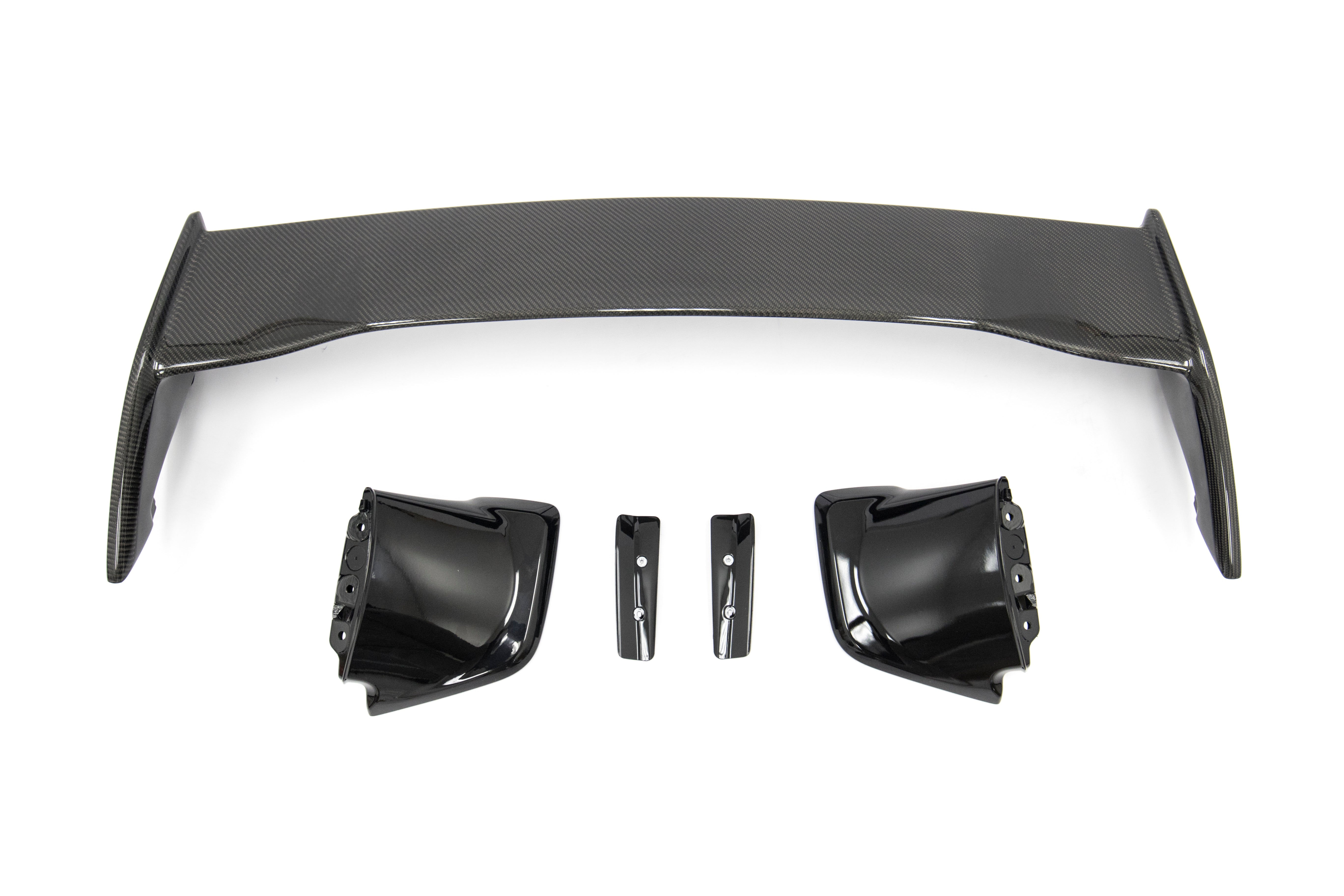 The OLM Silverline CF OEM S Style Spoiler with Black Bases is designed for