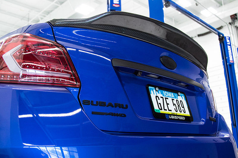 This OLM V Style CF Trunk Spoiler for 2015+ WRX / STI offers sleek style and