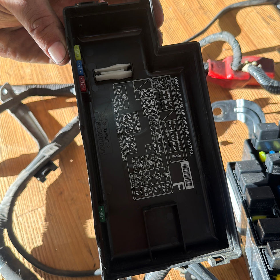 OEM Subaru fuse box cover with diagram and spare fuses plus harness
