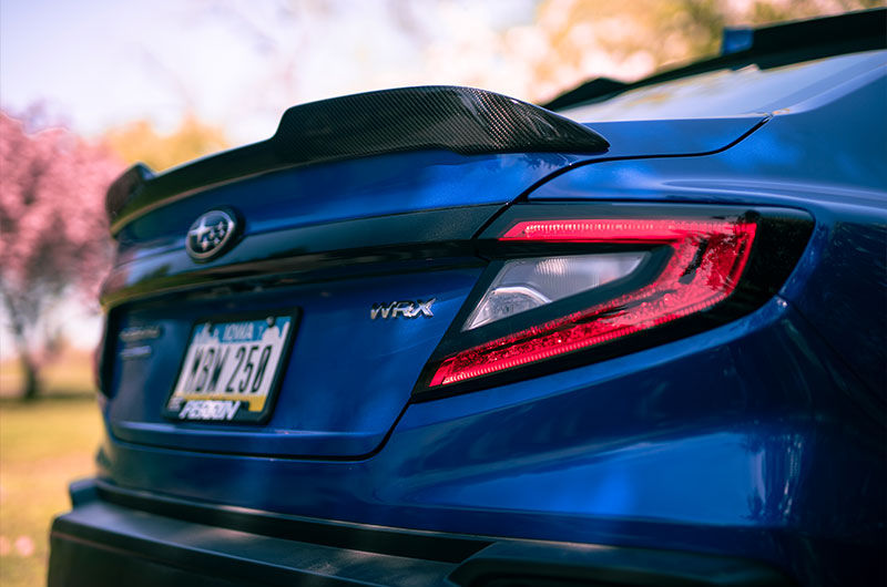 The OLM OE-style carbon trunk spoiler is praised for its great fitment, easy