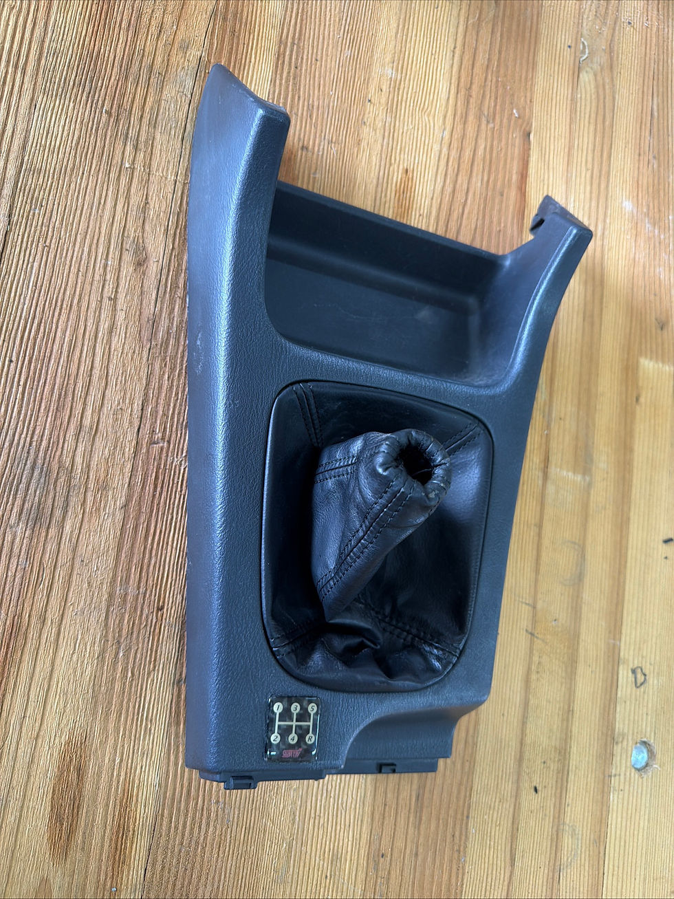 OEM 02-03 Impreza WRX center console trim with shift boot.