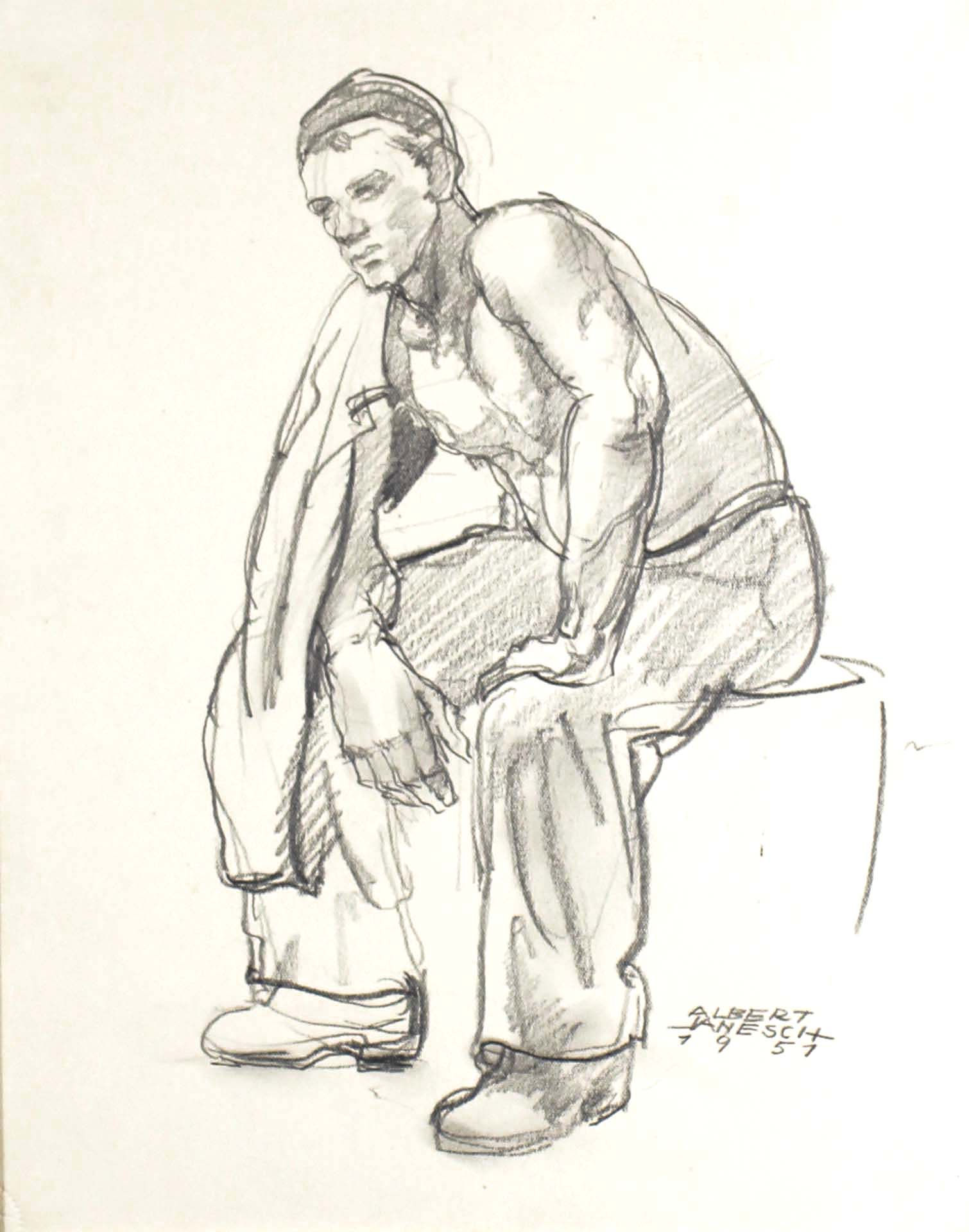 Arbeiter sitzt mit nacktem Oberkörper