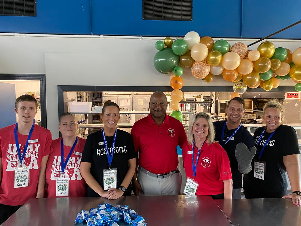 Deron with community volunteers at Camp Quality Greater KC