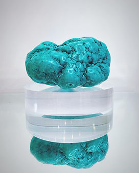 Natural Turquoise on clear, acrylic stand