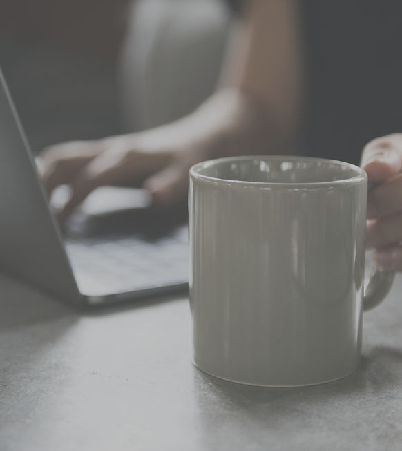 Beverage Mug and a Laptop_edited.jpg