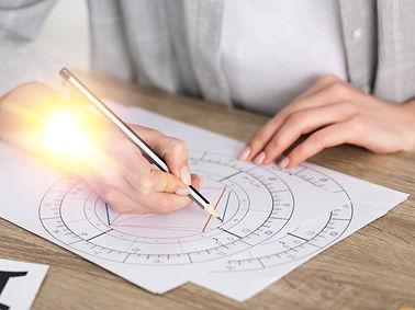 Astrologer Writing Natal Chart_edited.jpg