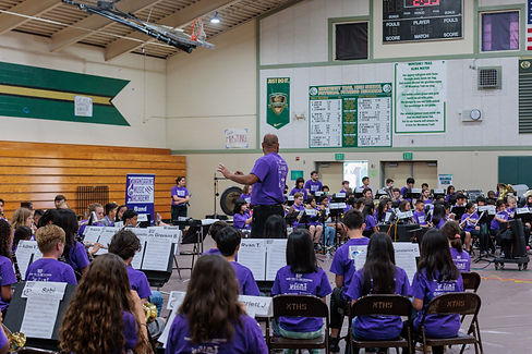 Mandarins Music Academy band performing in gymnasium.
