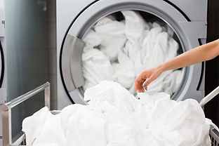 cropped-view-of-housemaid-near-white-bed-sheets-in-2021-08-30-19-52-28-utc.jpg