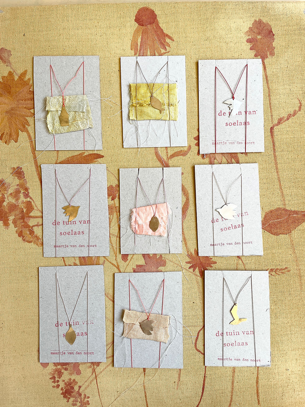 Thumbnail: golden leaf pendant