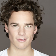Headshot of Man Wearing a White 