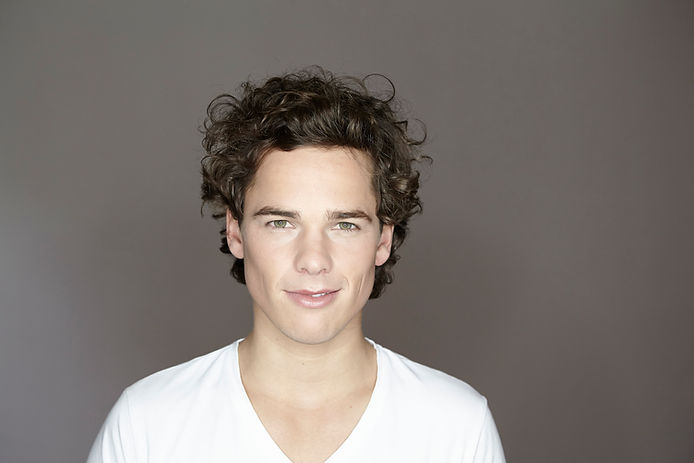 Headshot of Man Wearing a White