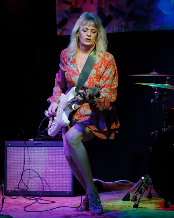 Woman playing electric guitar, Honest Lee Soul- Presented by the New Haven Lounge Series, stage performance.