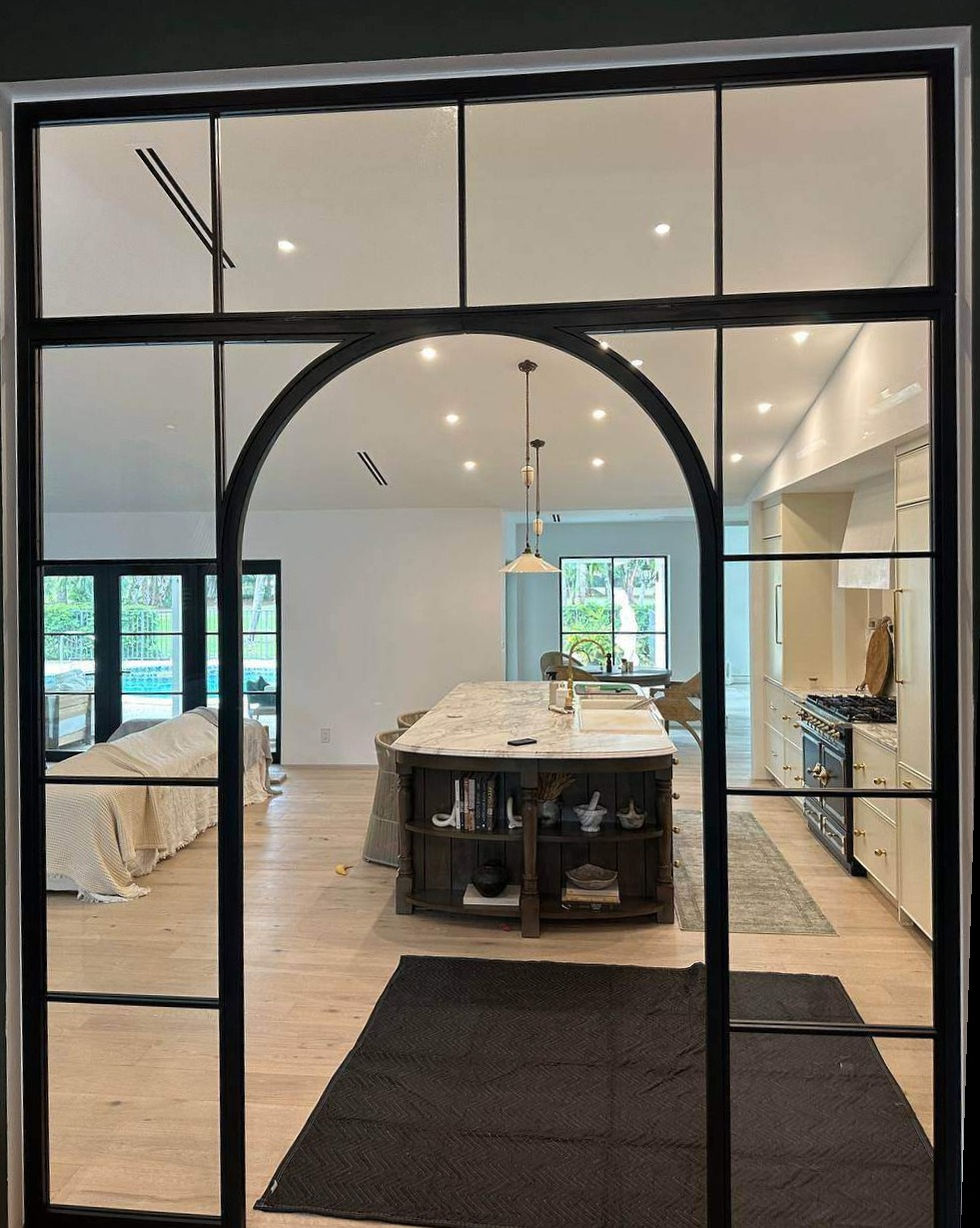12674 Steel TREVI fixed partition with arched portal arch 3-16 clear glass view 2