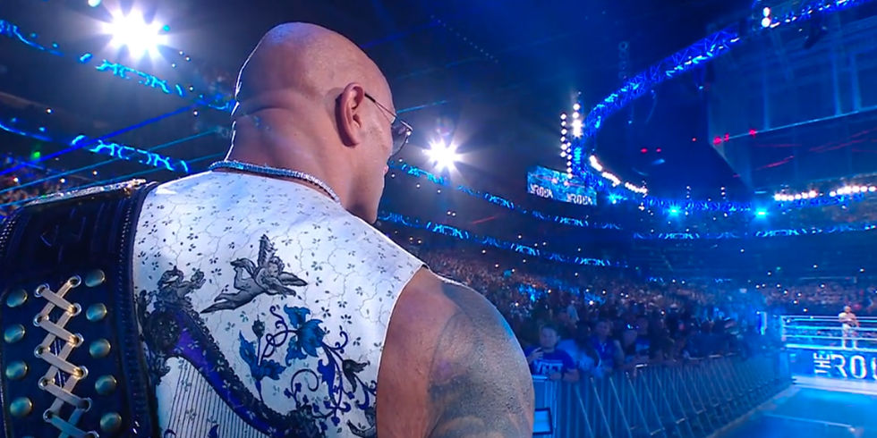 screenshot taken from netflix of the rock's return at wwe bad blood 2024