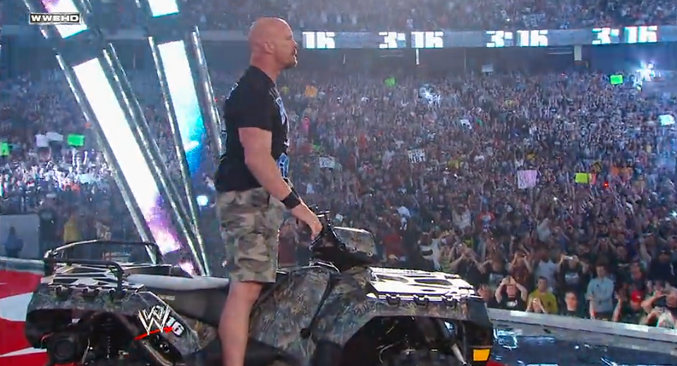 stone cold steve austin makes his entrance in his atv at wwe wrestlemania 27