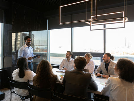 Workplace safety training session with employees participating in a team learning environment, supporting proactive safety awareness in 2026.