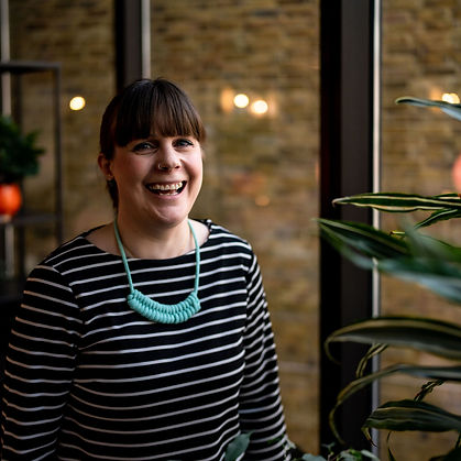 Wendy image, she is wearing a stripy top and turquoise necklace