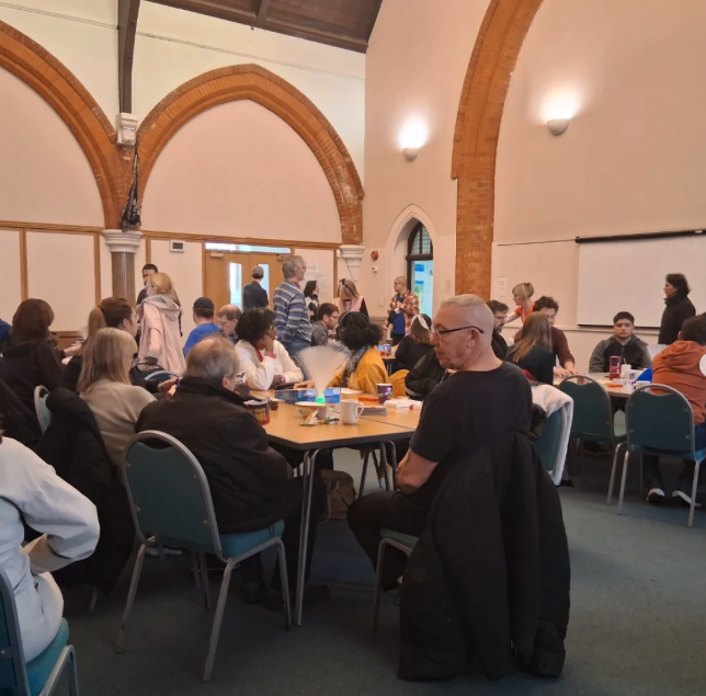 People gathering at the LAGC Ealing Community Café