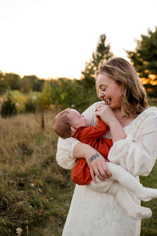 mom and baby loving on each other while getting there photos taken in Montgomery illinois