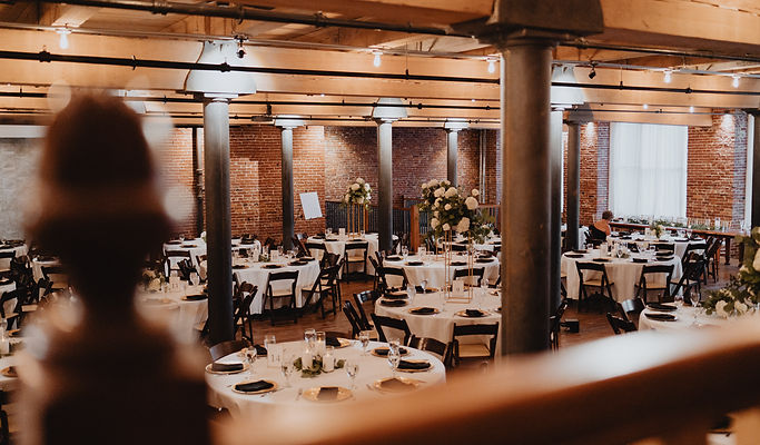 Greenery and candlelit reception décor