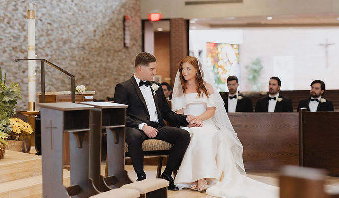 Bride and groom at Cure of Ars Catholic Church