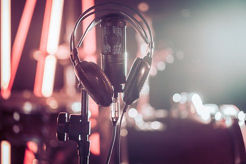 studio-microphone-and-headphones-on-a-close-up-sta-2YJSNSC.jpg