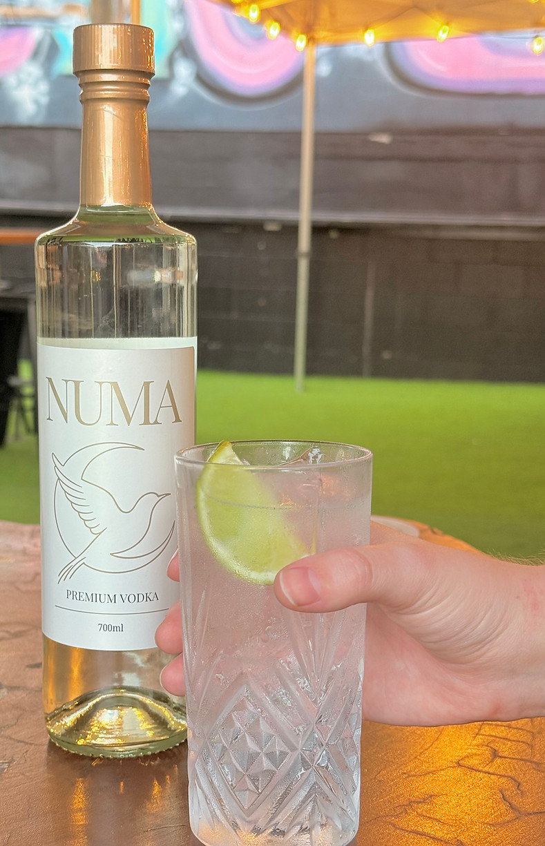 NUMA local aussie vodka bottle and cocktail with lime