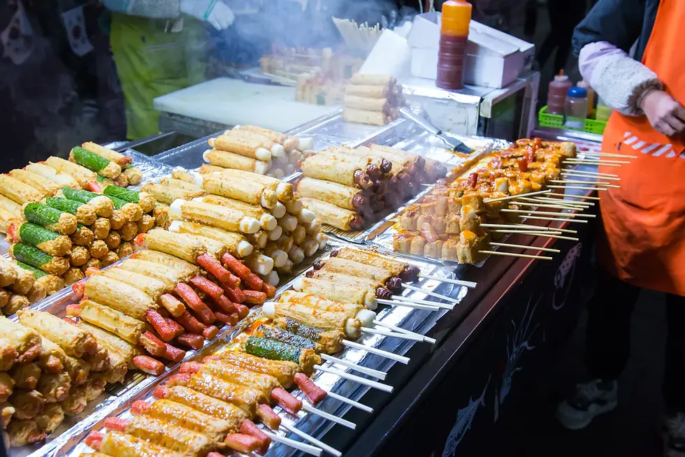 Korean_street_food_at_Myeong-Dong_night_market.webp