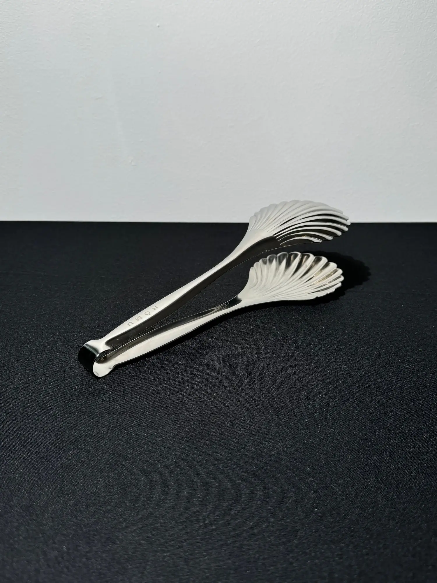 SHELL TONG 001