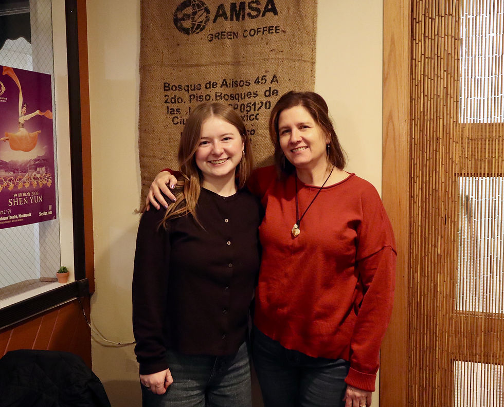 Makenna Cabrera and Lisa Beecroft pose for a photo together in Cajeta Coffee in White Bear Lake.
